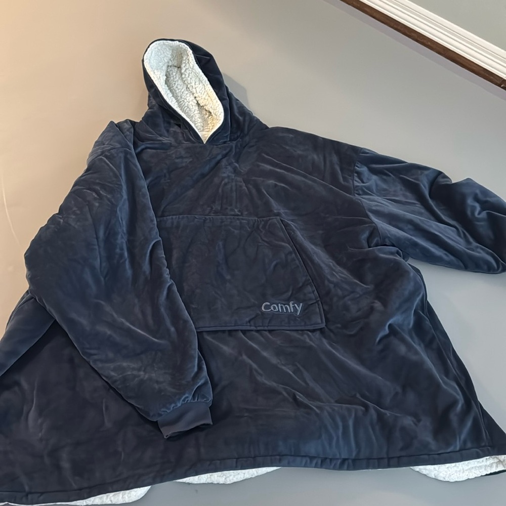The Comfy blanket hoodie with Sherpa inside. One Size Fits All